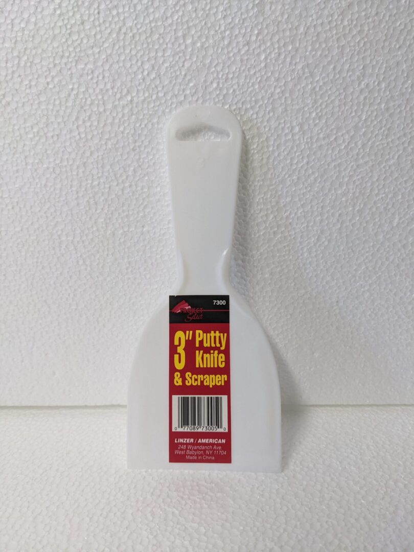 A 3 inch putty knife and scraper