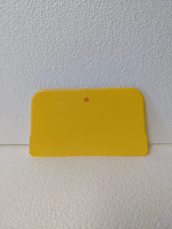 A basic plastic paint scraper