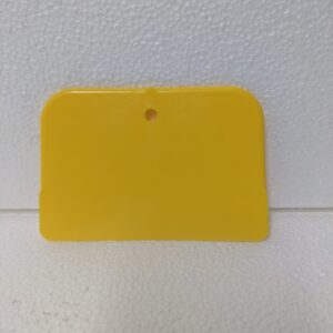 A picture of a plastic paint scraper