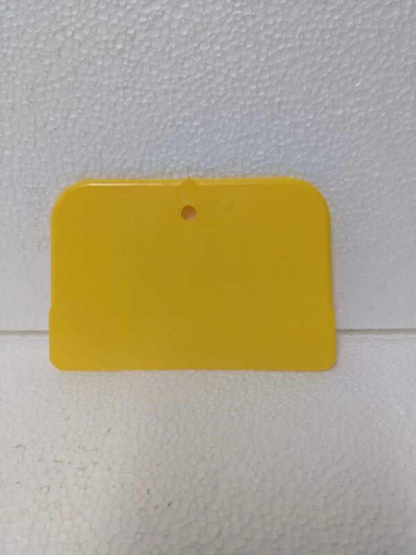 A picture of a plastic paint scraper