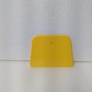 A regular plastic paint scraper image